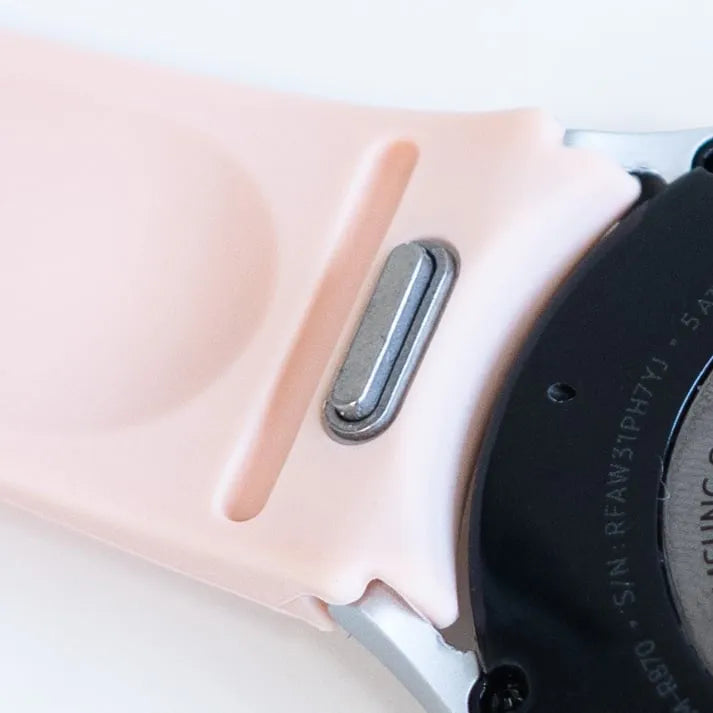 Silicone Strap 'One Push', pink, on a watch, 3/4 rear view
