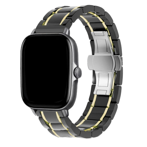 Metal Ceramic Link Strap, black/gold, on a watch, 3/4 front view