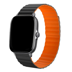 Magnetic Silicone Strap, black/orange, on a watch, 3/4 front view