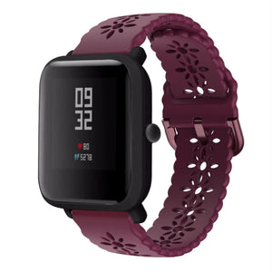 Patterned Silicone Strap, burgundy, on a watch, 3/4 front view