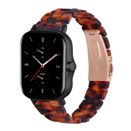 Metal Resin Strap, lava, on a watch, 3/4 front view
