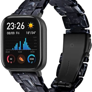 Metal Resin Strap, black/white, on a watch, 3/4 front view