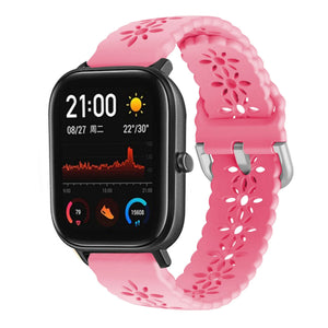 Patterned Silicone Strap, bright pink, on a watch, 3/4 front view