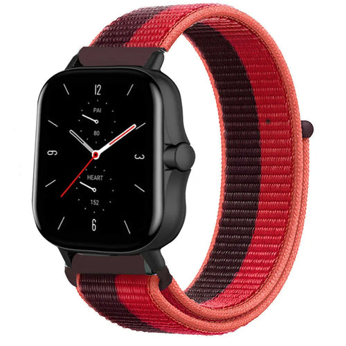 Nylon Strap, cherry magenta, on a watch, 3/4 front view