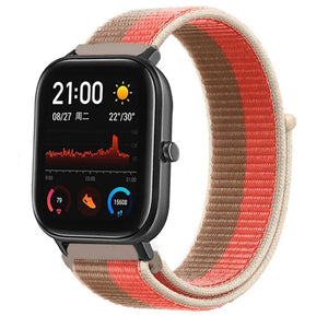 Nylon Strap, pink pomelo, on a watch, 3/4 front view