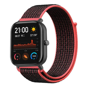 Nylon Strap, black/coral, on a watch, 3/4 front view