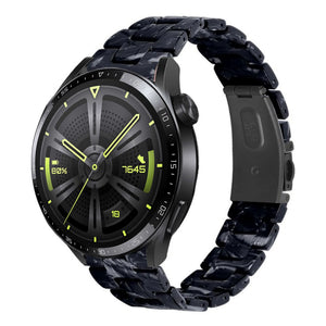 Metal Resin Strap, black/white, on a watch, 3/4 front view