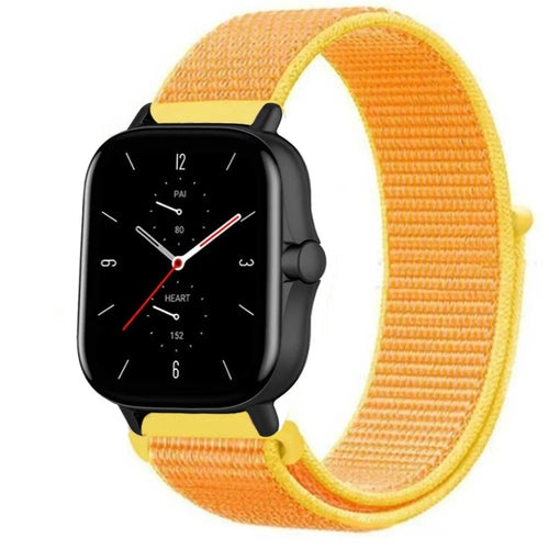 Nylon Strap, light yellow, on a watch, 3/4 front view
