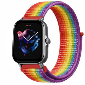 Nylon Strap, rainbow, on a watch, 3/4 front view