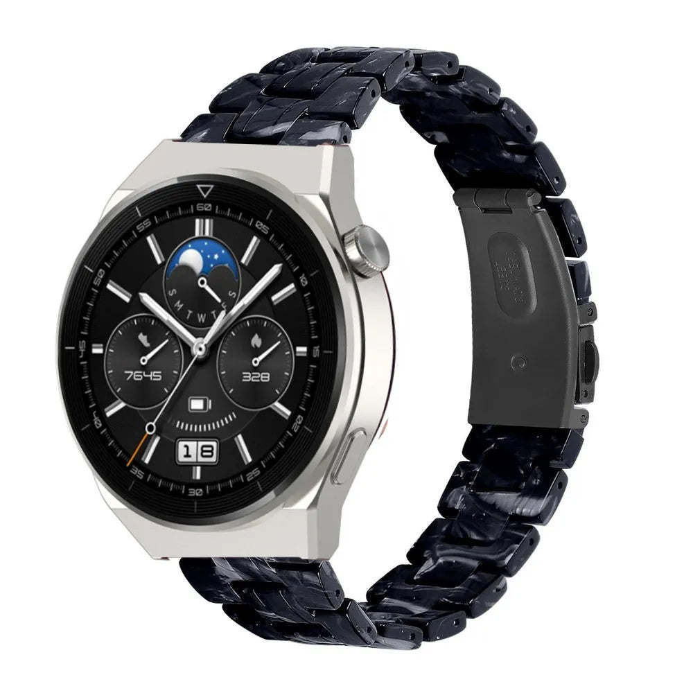Metal Resin Strap, black/white, on a watch, 3/4 front view