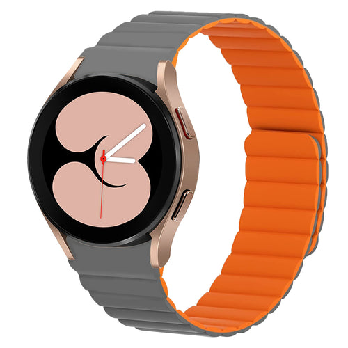 Magnetic Silicone Strap, grey/orange, on a watch, 3/4 front view