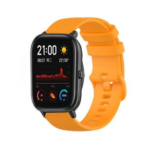 Premium Silicone Strap, orange, on a watch, 3/4 front view