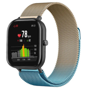 Milanese Strap, blue/gold, on a watch, 3/4 front view