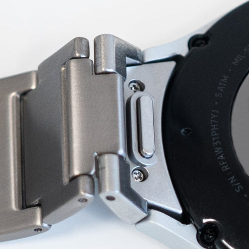 Titanium Strap 'One Push', on a watch, 3/4 rear view