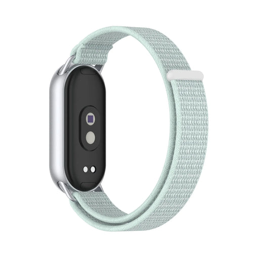 Modern Nylon Strap, cyan, on a watch, 3/4 rear view