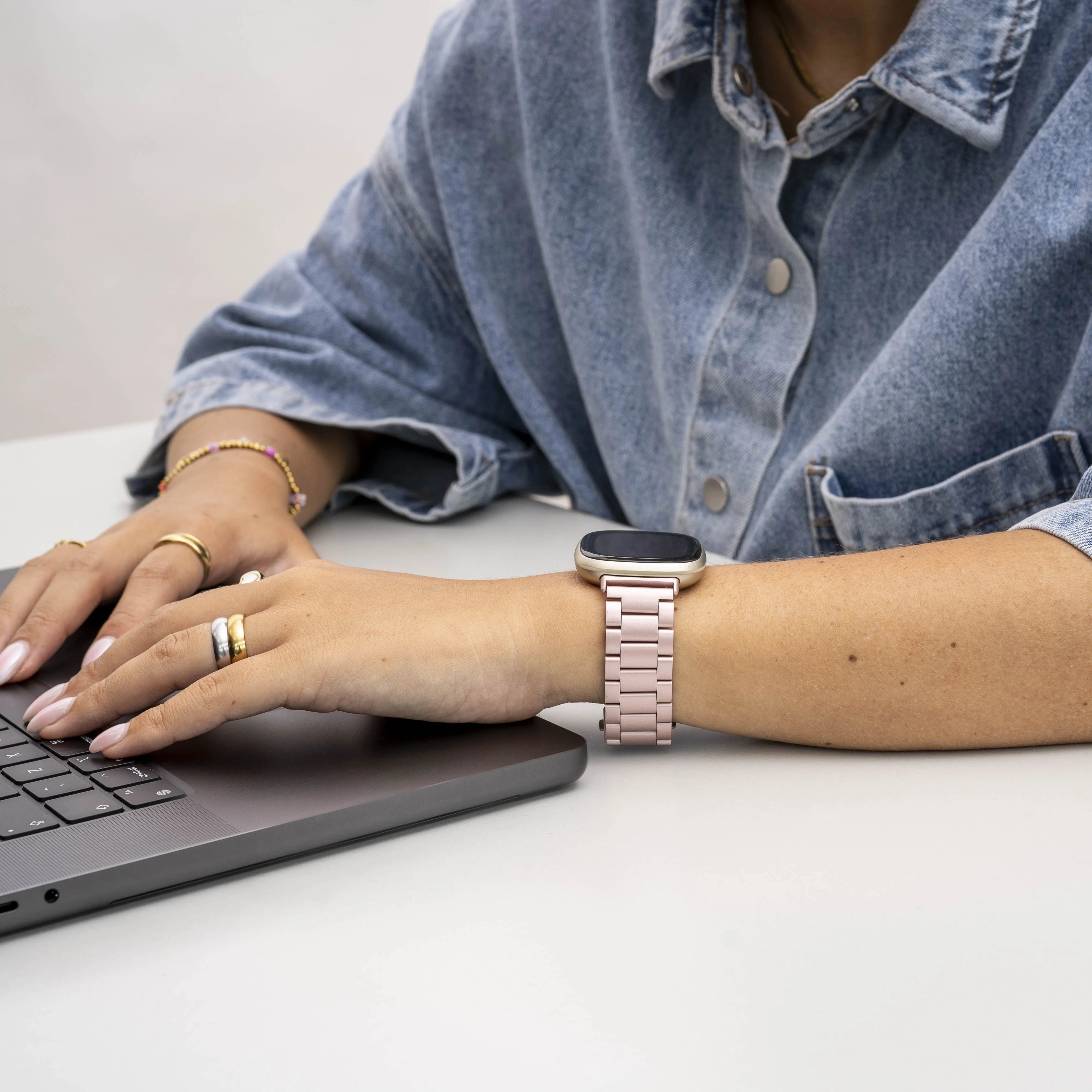 Fitbit Sense stalen band (roze)