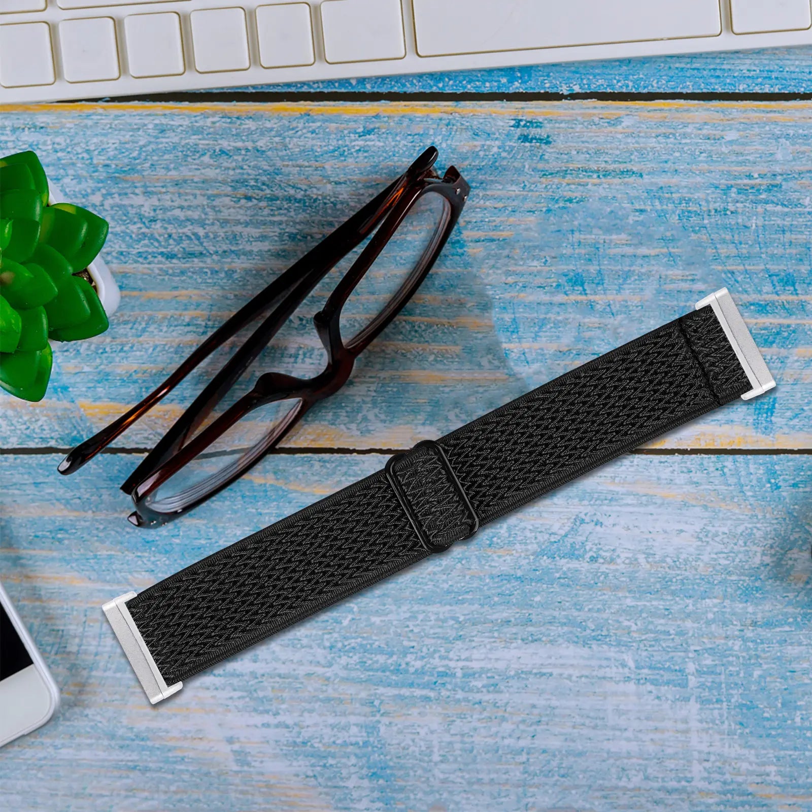 Fitbit Versa 4 elastisch bandje (zwart)