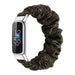 Fitbit Luxe scrunchie bandje (zwart goud)